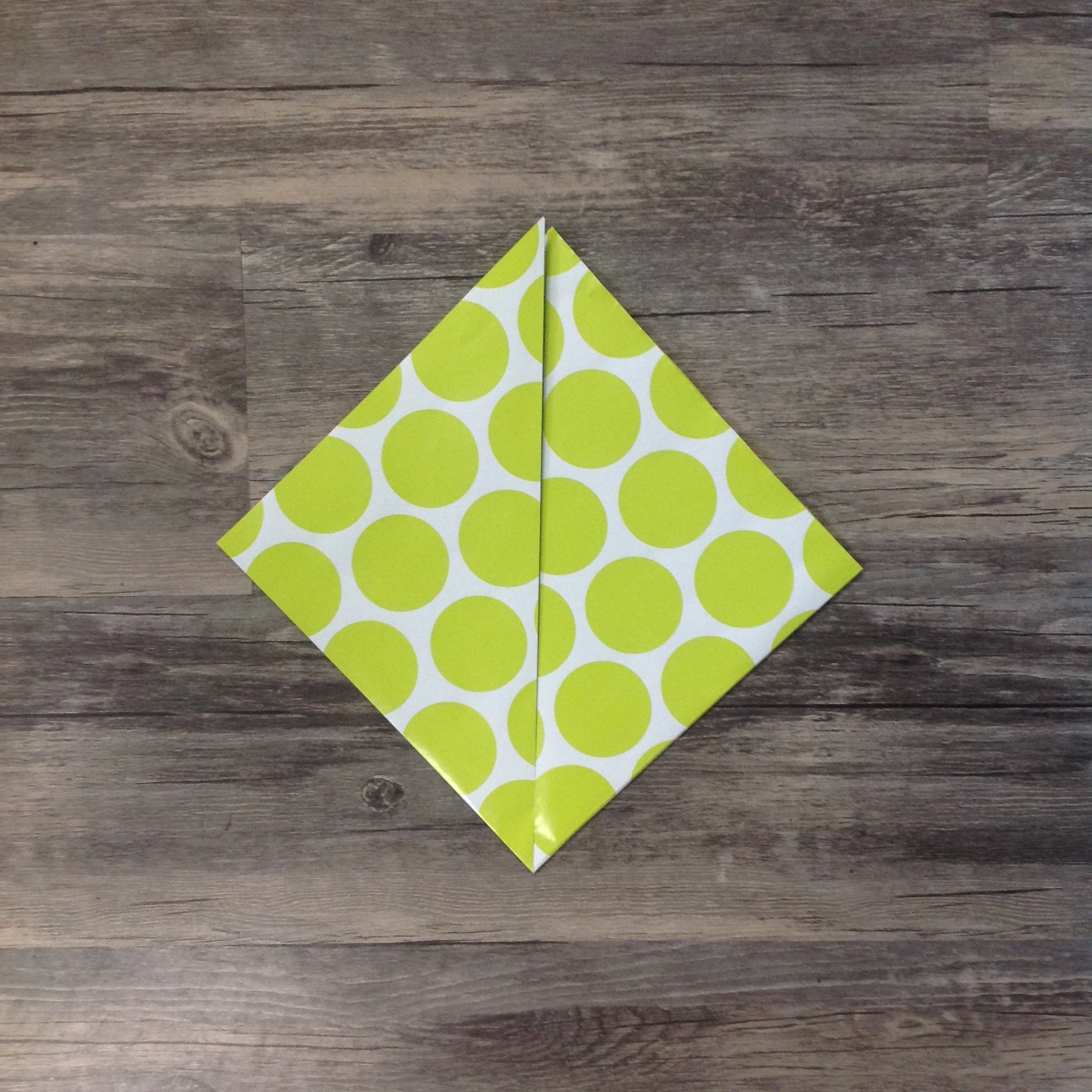 Paper Flower Origami | Folded Flower Tutorial | Origami Flower | Flower Party Decor These flowers can be made from scrapbook paper or wrapping paper to match your party or wedding decor. Simple and economical, and you can make them big or small for whatever you need them for! | Six Clever Sisters