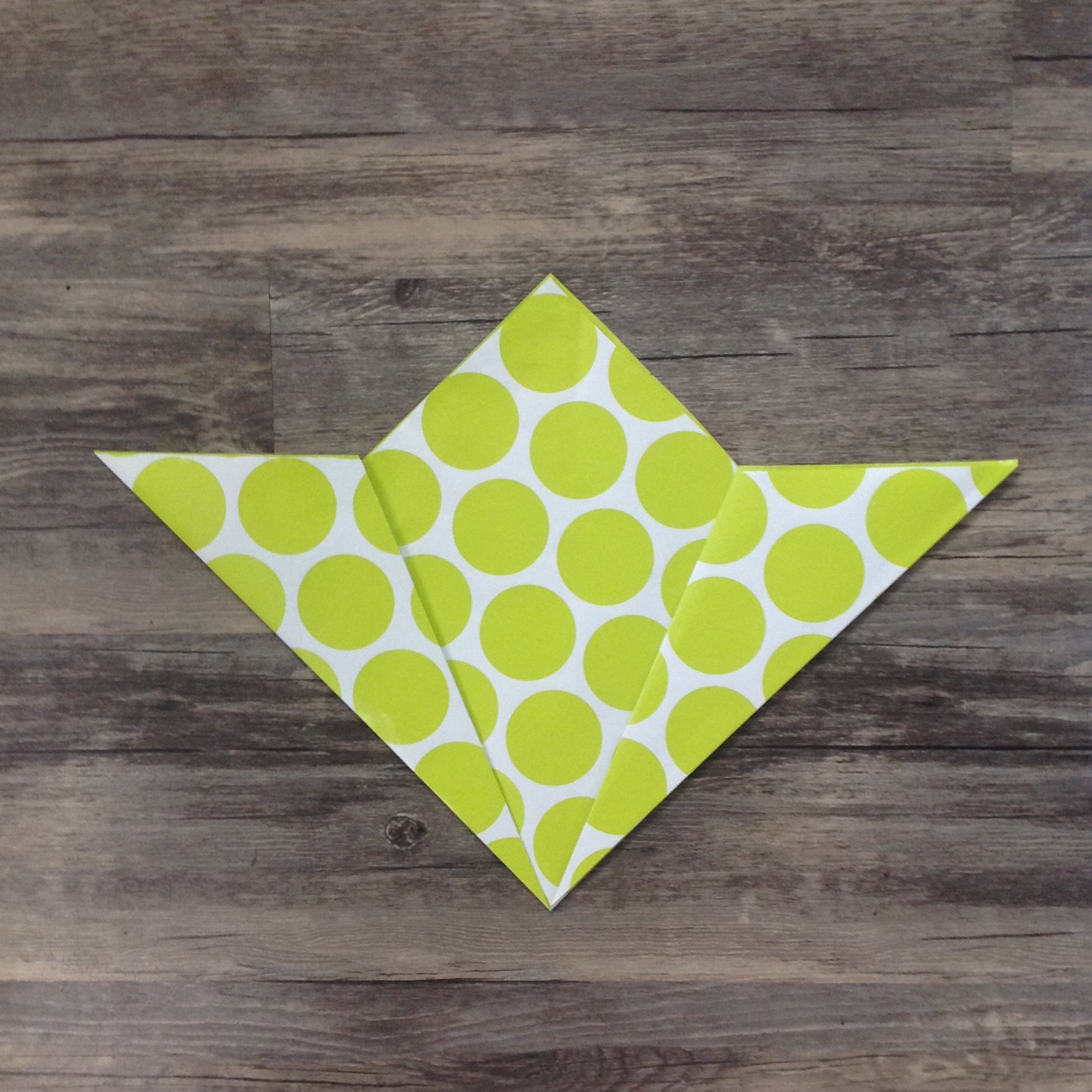 Paper Flower Origami | Folded Flower Tutorial | Origami Flower | Flower Party Decor These flowers can be made from scrapbook paper or wrapping paper to match your party or wedding decor. Simple and economical, and you can make them big or small for whatever you need them for! | Six Clever Sisters