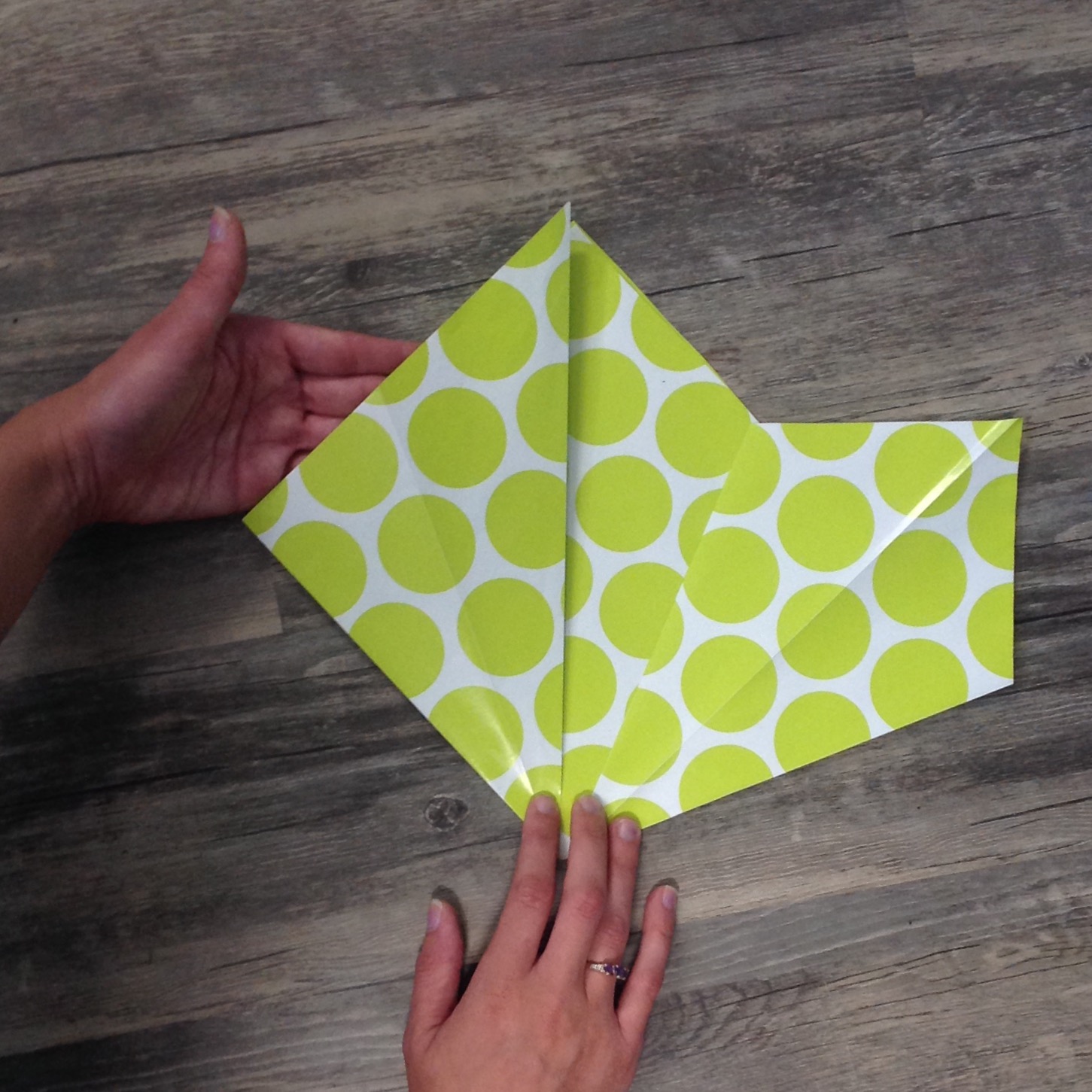 Paper Flower Origami | Folded Flower Tutorial | Origami Flower | Flower Party Decor These flowers can be made from scrapbook paper or wrapping paper to match your party or wedding decor. Simple and economical, and you can make them big or small for whatever you need them for! | Six Clever Sisters