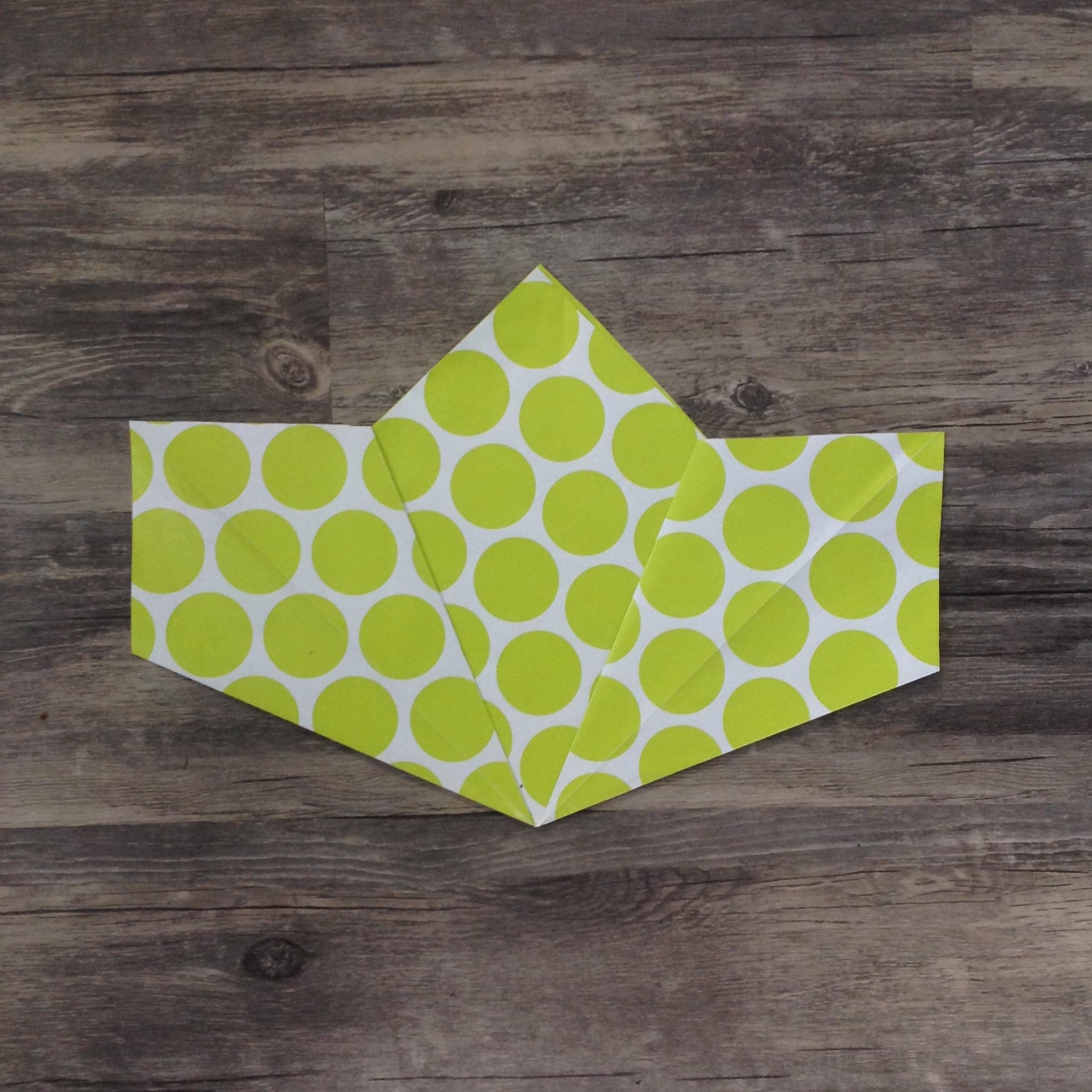 Paper Flower Origami | Folded Flower Tutorial | Origami Flower | Flower Party Decor These flowers can be made from scrapbook paper or wrapping paper to match your party or wedding decor. Simple and economical, and you can make them big or small for whatever you need them for! | Six Clever Sisters