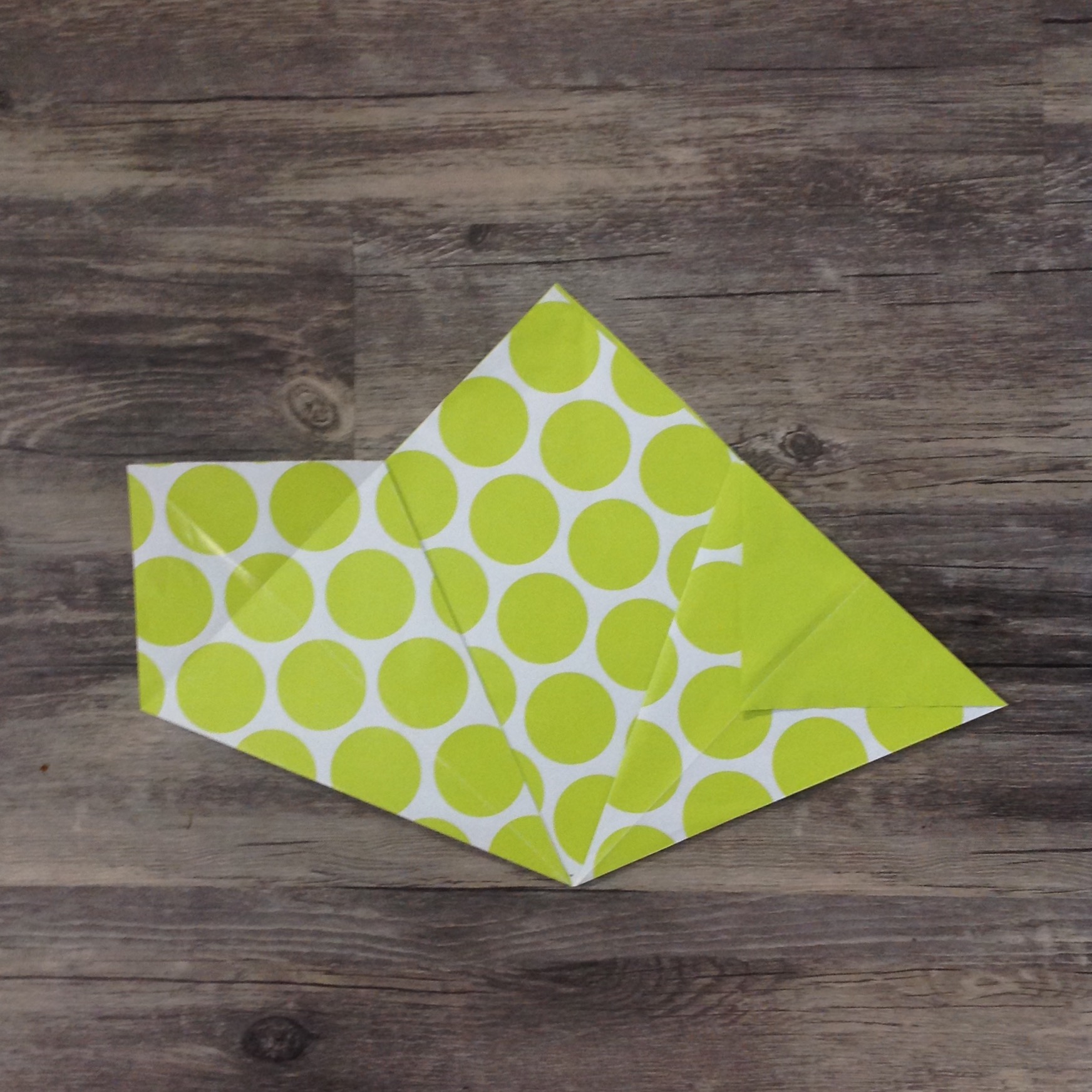 Paper Flower Origami | Folded Flower Tutorial | Origami Flower | Flower Party Decor These flowers can be made from scrapbook paper or wrapping paper to match your party or wedding decor. Simple and economical, and you can make them big or small for whatever you need them for! | Six Clever Sisters