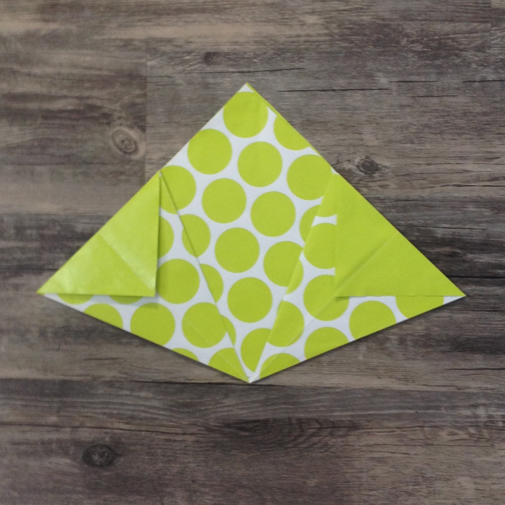 Paper Flower Origami | Folded Flower Tutorial | Origami Flower | Flower Party Decor These flowers can be made from scrapbook paper or wrapping paper to match your party or wedding decor. Simple and economical, and you can make them big or small for whatever you need them for! | Six Clever Sisters