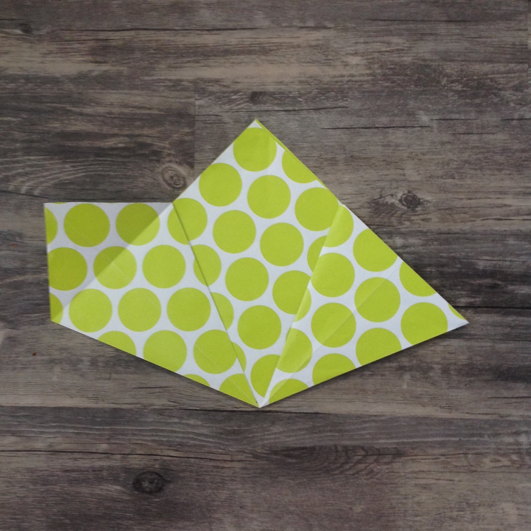 Paper Flower Origami | Folded Flower Tutorial | Origami Flower | Flower Party Decor These flowers can be made from scrapbook paper or wrapping paper to match your party or wedding decor. Simple and economical, and you can make them big or small for whatever you need them for! | Six Clever Sisters