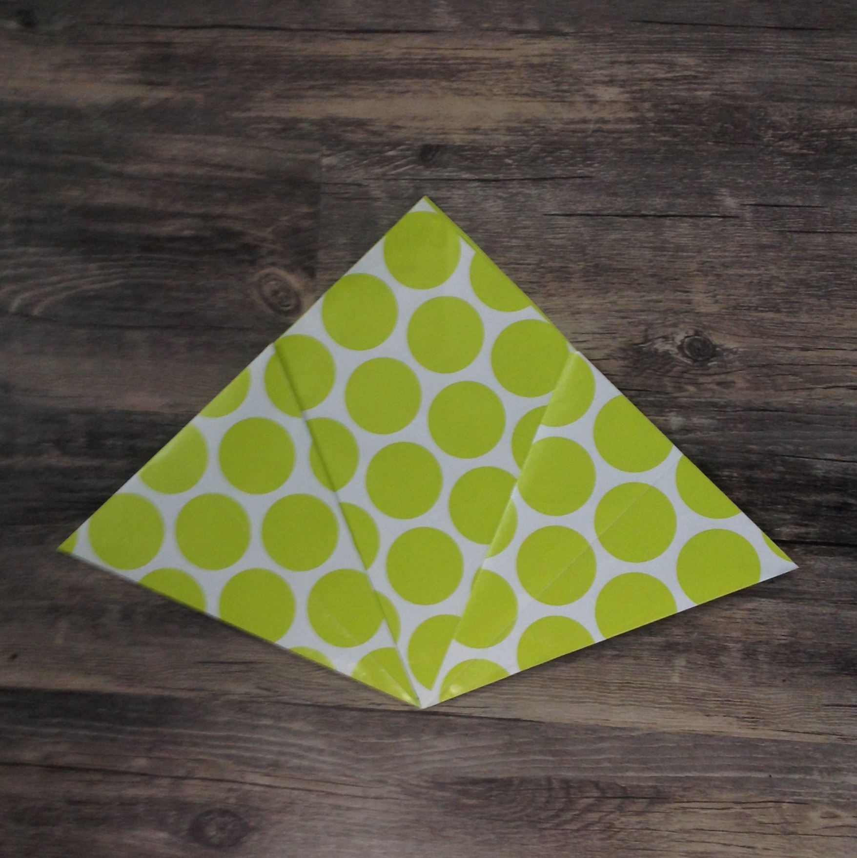 Paper Flower Origami | Folded Flower Tutorial | Origami Flower | Flower Party Decor These flowers can be made from scrapbook paper or wrapping paper to match your party or wedding decor. Simple and economical, and you can make them big or small for whatever you need them for! | Six Clever Sisters