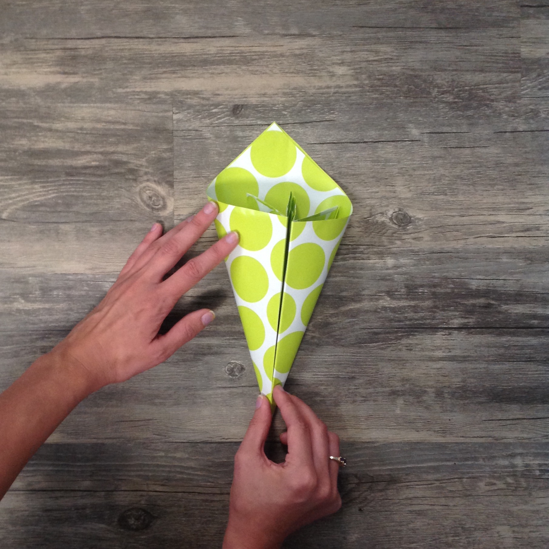 Paper Flower Origami | Folded Flower Tutorial | Origami Flower | Flower Party Decor These flowers can be made from scrapbook paper or wrapping paper to match your party or wedding decor. Simple and economical, and you can make them big or small for whatever you need them for! | Six Clever Sisters