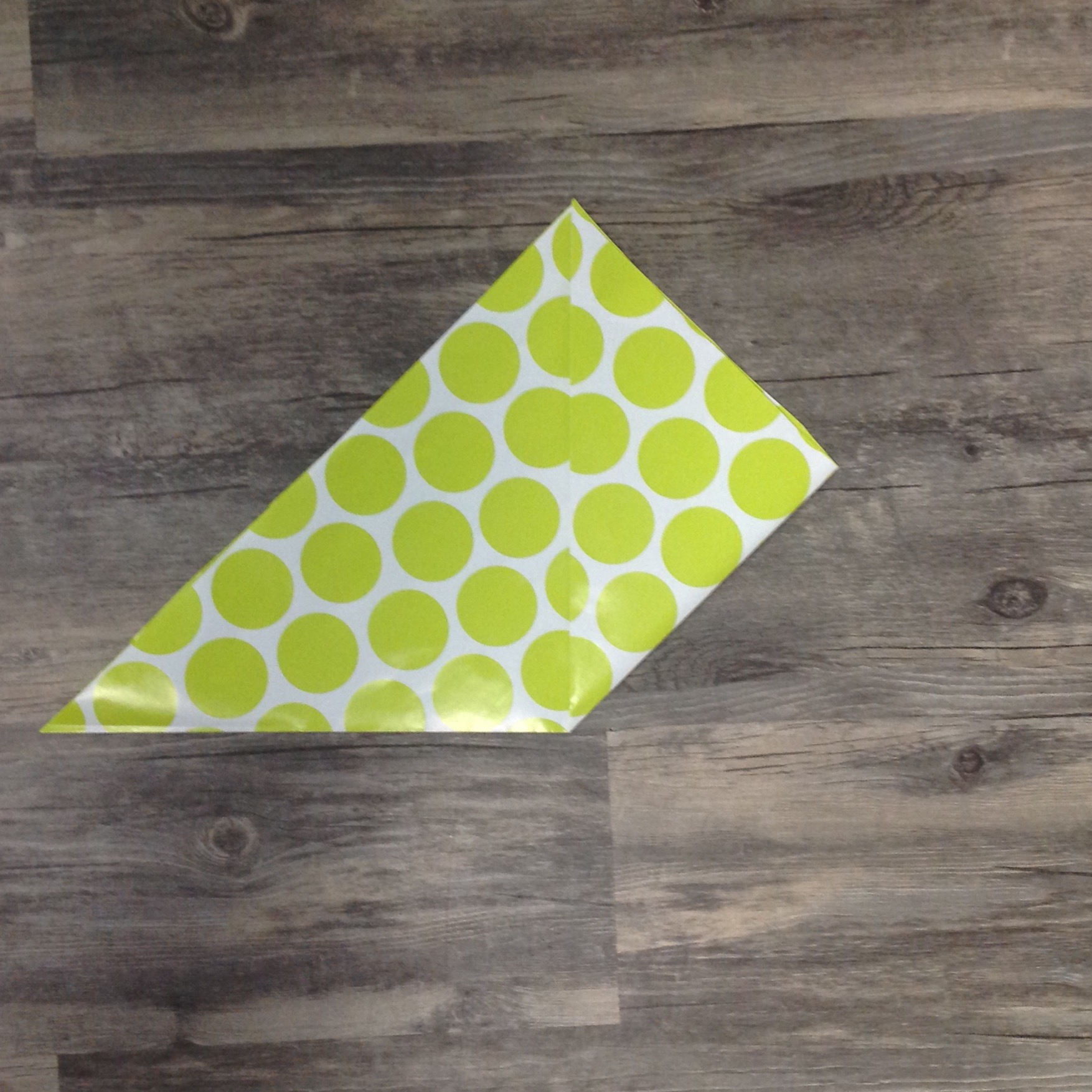 Paper Flower Origami | Folded Flower Tutorial | Origami Flower | Flower Party Decor These flowers can be made from scrapbook paper or wrapping paper to match your party or wedding decor. Simple and economical, and you can make them big or small for whatever you need them for! | Six Clever Sisters