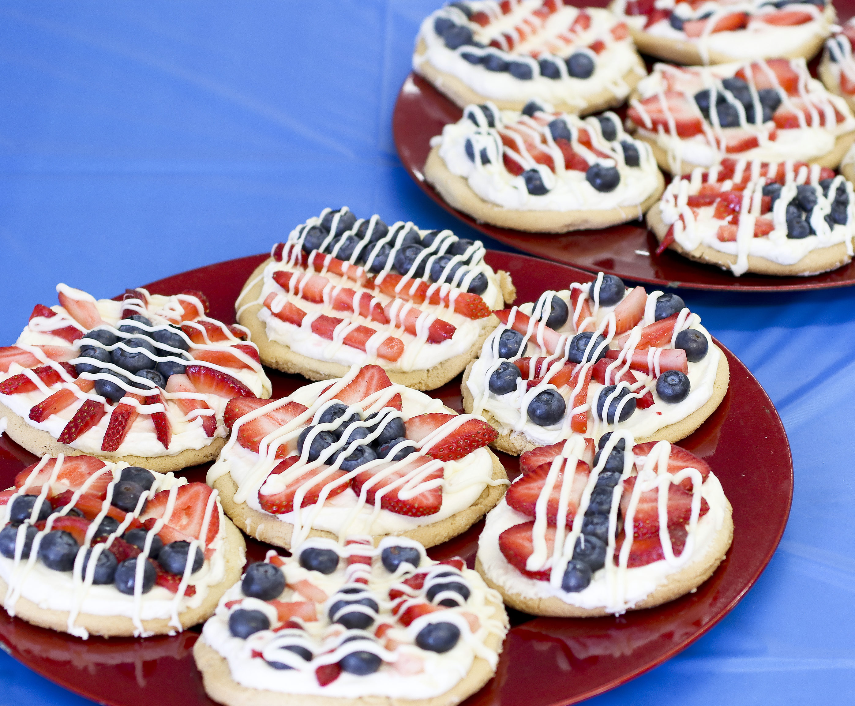 Mini Fruit Pizzas | Fruit Pizza Recipe | Fourth of July Dessert | Berry Pizza | Fourth of July Pizza | Make these mini fruit pizzas with blueberries and strawberries for your Fourth of July celebration!