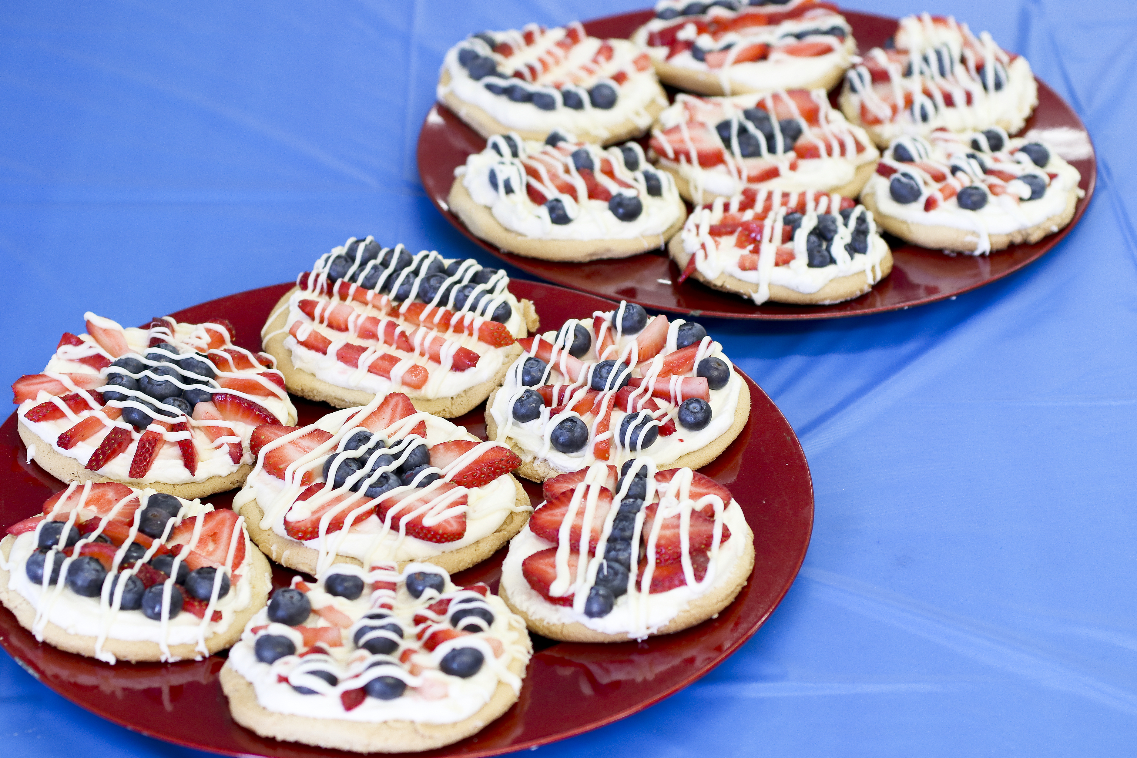 Mini Fruit Pizzas | Fruit Pizza Recipe | Fourth of July Dessert | Berry Pizza | Fourth of July Pizza | Make these mini fruit pizzas with blueberries and strawberries for your Fourth of July celebration!