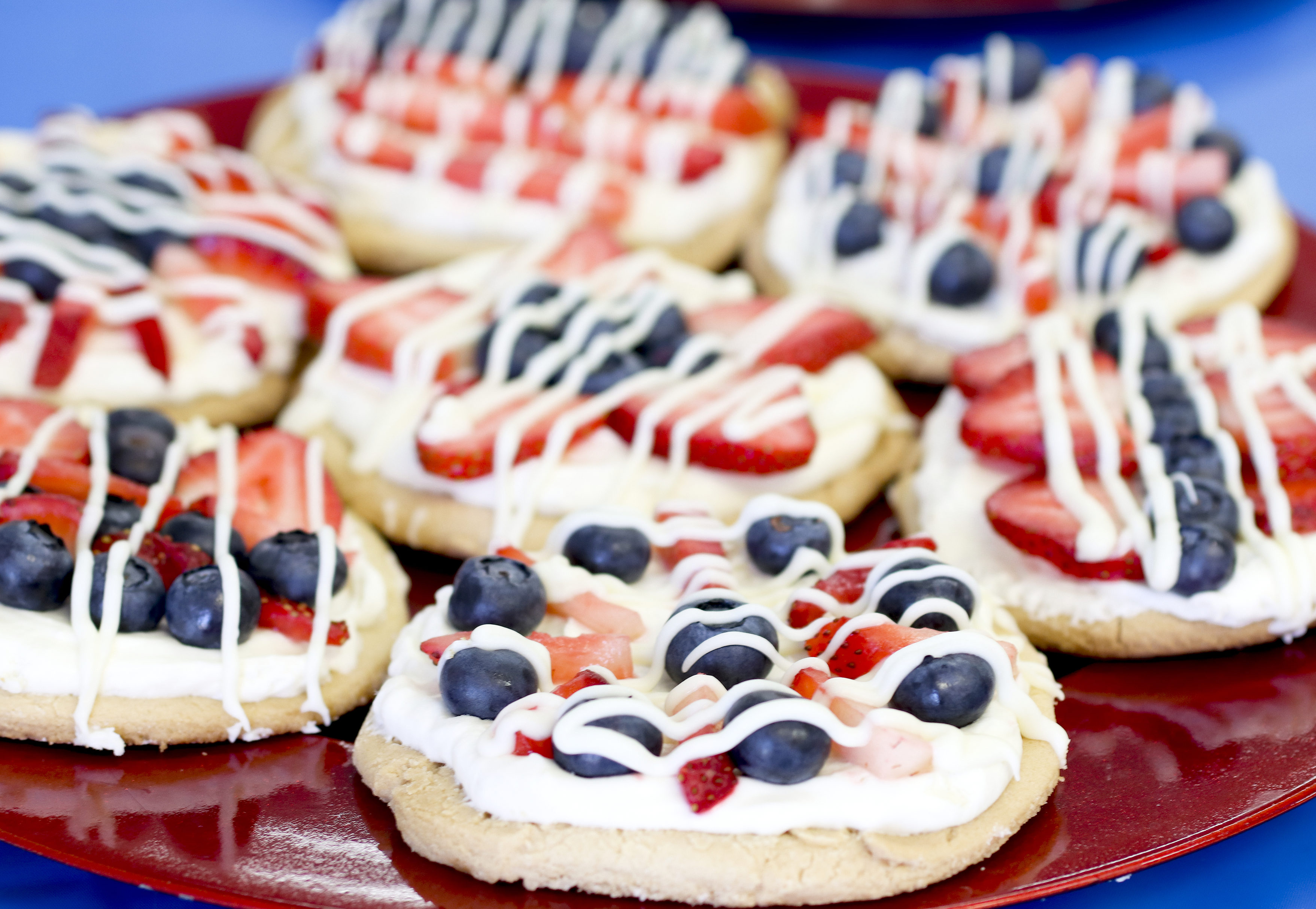 Mini Fruit Pizzas | Fruit Pizza Recipe | Fourth of July Dessert | Berry Pizza | Fourth of July Pizza | Make these mini fruit pizzas with blueberries and strawberries for your Fourth of July celebration!