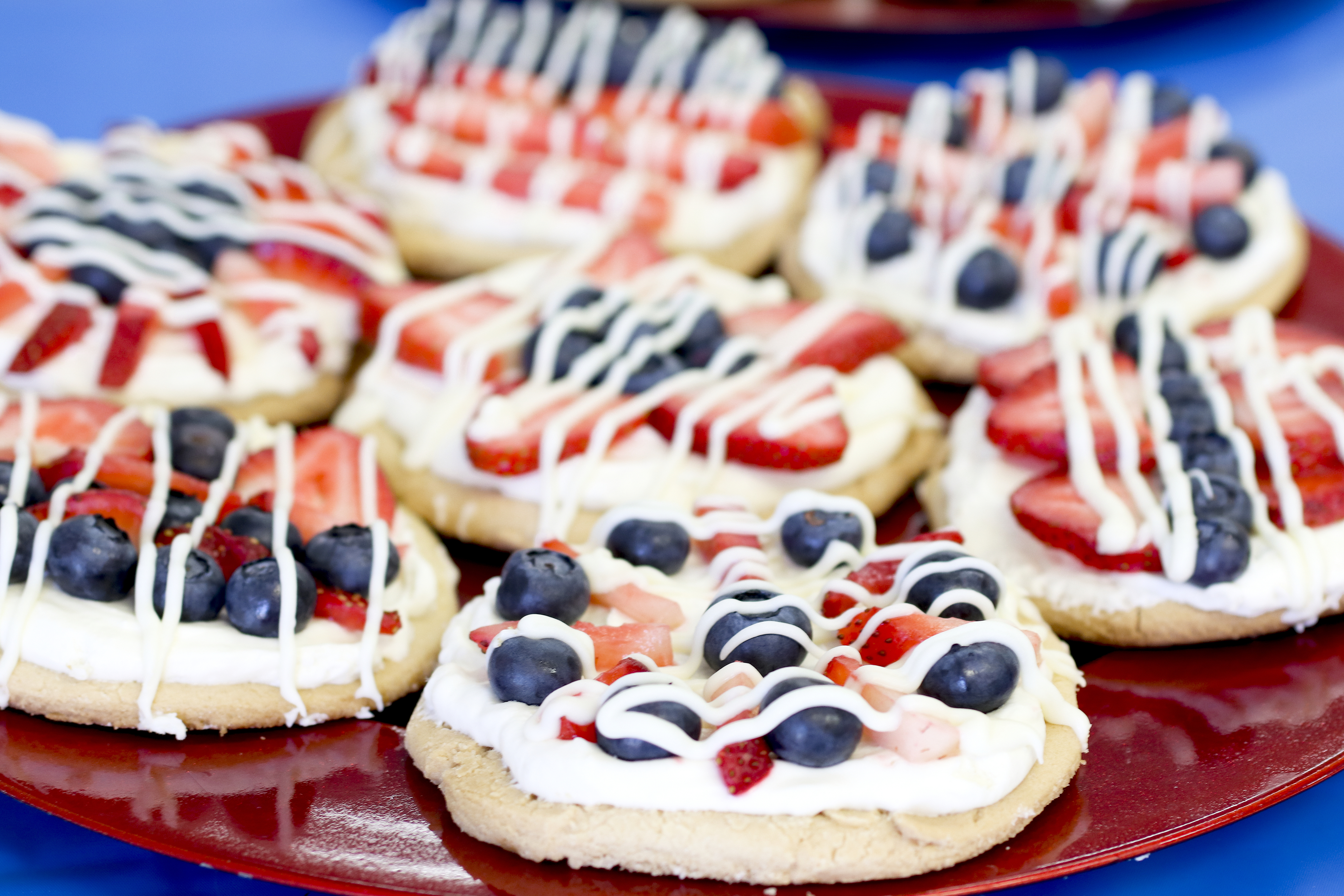 Mini Fruit Pizzas | Fruit Pizza Recipe | Fourth of July Dessert | Berry Pizza | Fourth of July Pizza | Make these mini fruit pizzas with blueberries and strawberries for your Fourth of July celebration!