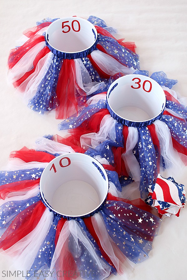 Backyard Games | Backyard Games for Kids | Backyard Games for 4th of July | Backyard Games USA | Backyard Games Ideas | Backyard Games DIY | Backyard Games and Activities | Backyard Games for Fourth of July | Backyard Games BBQ | Looking for that great backyard game to bring the fun to the party? These 12 game ideas will do just that! Six Clever Sisters