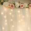 DIY Lit Tulle Backdrop | Bridal | Wedding | Bridal Shower | Wedding Shower | Photography Backdrop | Floral Decor | Backdrop | Background | Bride | Bride to Be | Wedding Shower Ideas | Shower on a Budget | Baby Shower | Simple Decorating Ideas | Easy Decor | Quick tutorial on Six Clever Sisters!