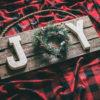 DIY Joy Christmas Sign | Pallet Sign Christmas | Wood Pallet Christmas Sign | Pallet Sign Ideas for Christmas | Pallet Board Christmas Sign | Rustic Christmas Sign | Rustic Christmas Pallet Signs | Rustic Wood Christmas Sign | Joy Sign Christmas Decor | How to Make a Joy Christmas Sign | Joy Christmas Wood Sign | Joy Christmas Sign DIY | Looking for some new decor to spruce up your home this holiday season? #palletprojects #christmascrafts #christmasdecor #sixcleversisters