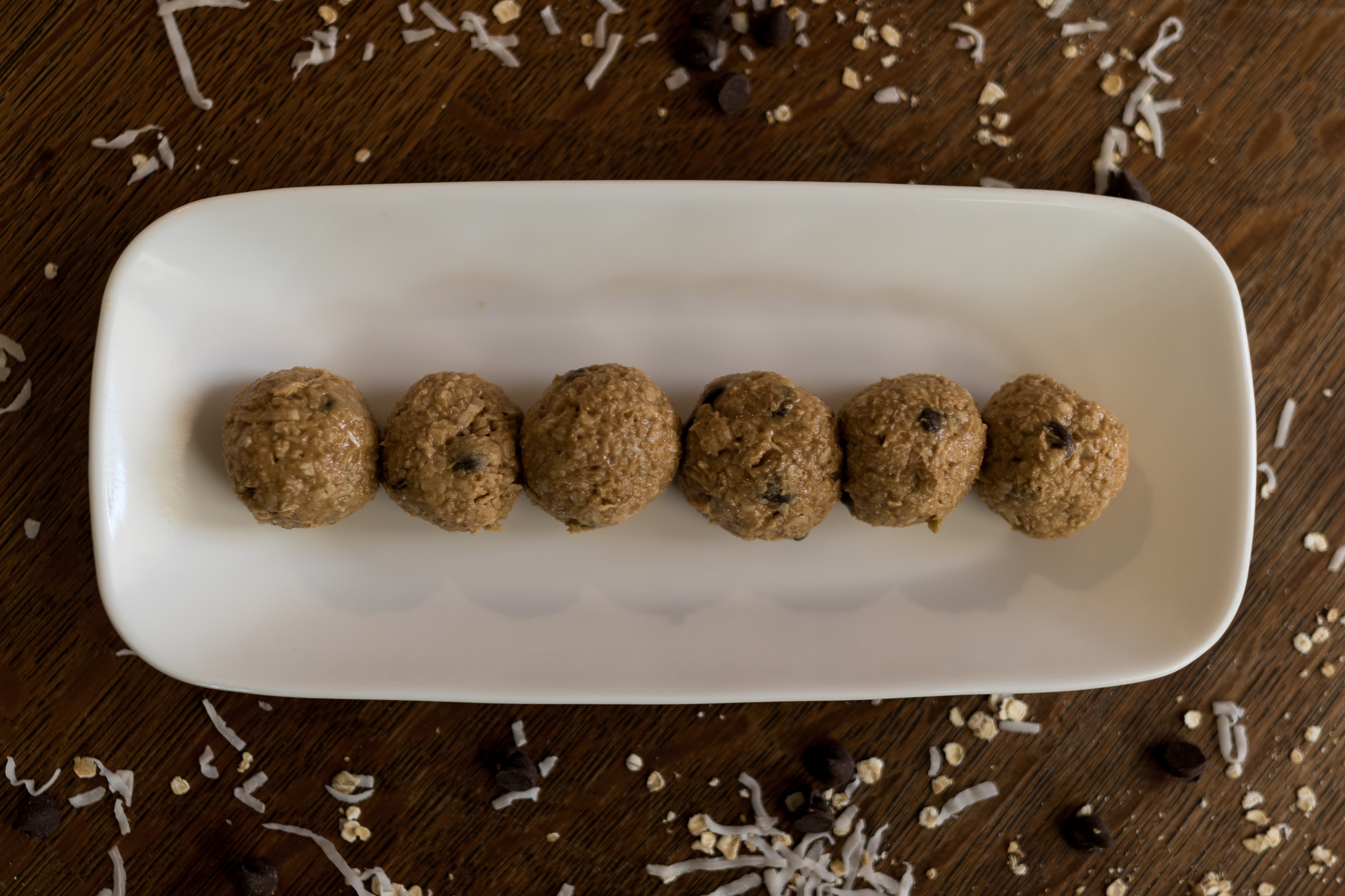 Protein Ball Recipe | Energy Balls | No Bake Dessert | Energy Bites | Protein Bites | No Bake Energy Bites | Peanut Butter Balls | These five ingredient protein balls are a breeze to make and a delicious treat when you need that afternoon pick-me-up. Sweetened only with sugar, they are a great option for a guilt-free snack! Find the recipe at SixCleverSisters.com