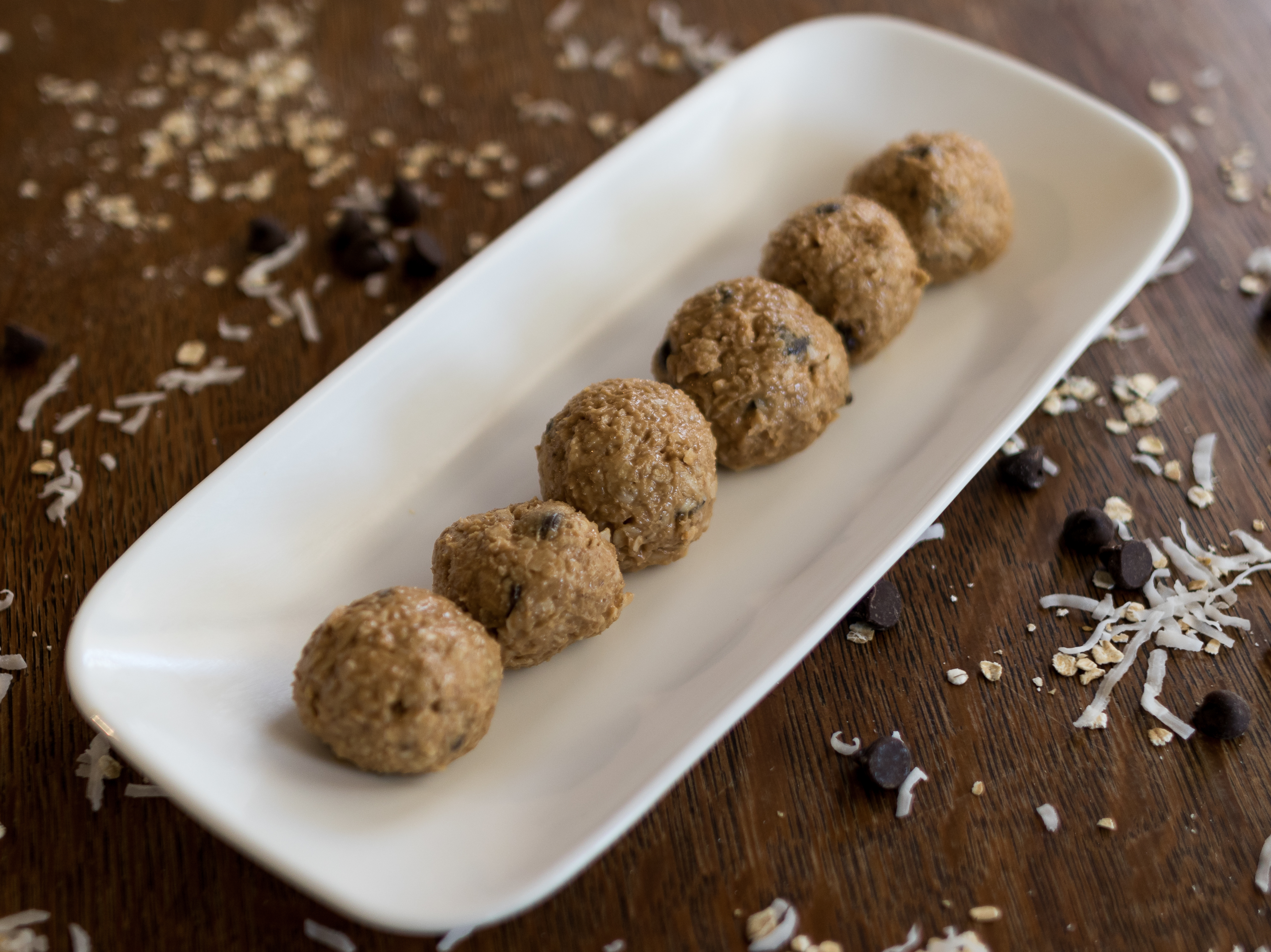 No Bake Protein Balls | Energy Balls | No Bake Dessert | Energy Bites | Protein Bites | No Bake Energy Bites | Peanut Butter Balls | These five ingredient protein balls are a breeze to make and a delicious treat when you need that afternoon pick-me-up. Sweetened only with sugar, they are a great option for a guilt-free snack! Find the recipe at SixCleverSisters.com