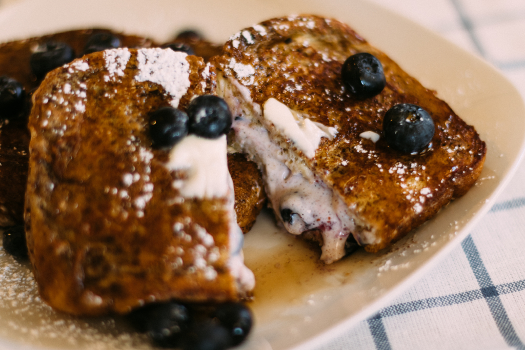 Blueberry Stuffed French Toast | French Toast | Stuffed French Toast Recipe | Easy French Toast Recipe | Taking brunch to a whole new level with this recipe! It's so delicious and so easy to make . . . find the recipe at SixCleverSisters.com.