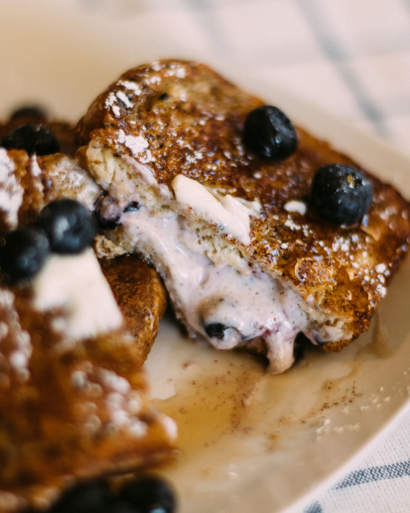 Blueberry Stuffed French Toast | French Toast | Stuffed French Toast Recipe | Easy French Toast Recipe | Taking brunch to a whole new level with this recipe! It's so delicious and so easy to make . . . find the recipe at SixCleverSisters.com.