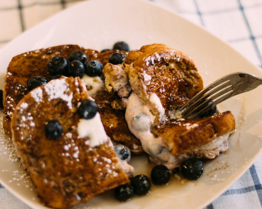 Blueberry Stuffed French Toast | French Toast | Stuffed French Toast Recipe | Easy French Toast Recipe | Taking brunch to a whole new level with this recipe! It's so delicious and so easy to make . . . find the recipe at SixCleverSisters.com.