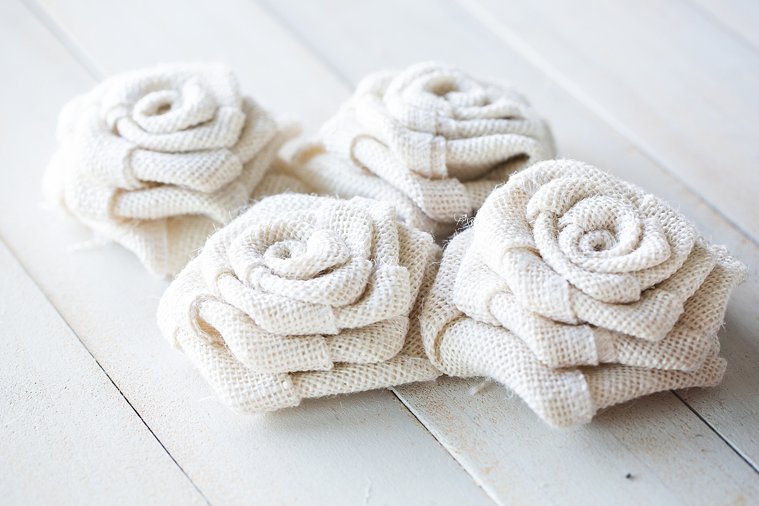 Burlap Rose Garland | DIY Burlap Garland | DIY Flower Garland Easy | DIY Rose Garland Shabby Chic | DIY Burlap Roses | Easy instructions on how to make a Burlap Rose Garland on the Six Clever Sisters blog!