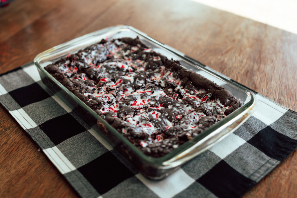 Candy Cane Brownies | Peppermint Brownies | Chocolate Mint Brownies | Chocolate Cookie Bars | Chocolate Mint Bars | Easy 6 Ingredient Brownies | These delicious Candy Cane Brownies use only 6 ingredients - easy to make and sure to please everyone with their chocolate-y gooeyness. Find the recipe at SixCleverSisters.com 