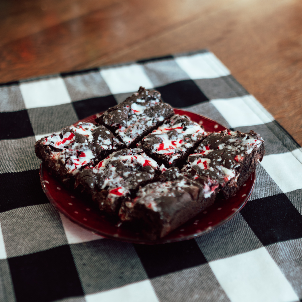 Candy Cane Brownies | Peppermint Brownies | Chocolate Mint Brownies | Chocolate Cookie Bars | Chocolate Mint Bars | Easy 6 Ingredient Brownies | These delicious Candy Cane Brownies use only 6 ingredients - easy to make and sure to please everyone with their chocolate-y gooeyness. Find the recipe at SixCleverSisters.com 