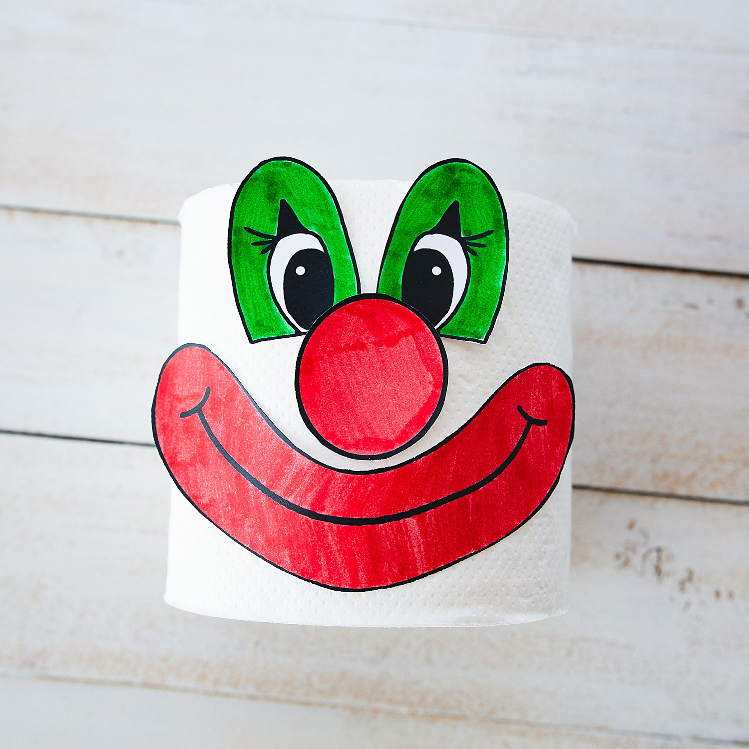 Toilet Paper Clown Kids Craft | Clown Crafts for Kids | Clown Crafts Preschool | Toilet Paper Crafts for Kids | Clown craft that you make on a full roll of toilet paper has free printables on the Six Clever Sisters blog!