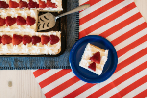 Flag Fruit Pizza | Fruit Pizza Recipe | Fourth of July Recipe | Patriotic Dessert | American Flag Dessert | Summer Picnic Dessert | Fruit Pizza Dessert | This yummy and easy-to-make flag fruit pizza is great for any July Fourth celebration! Find the recipe at SixCleverSisters.com