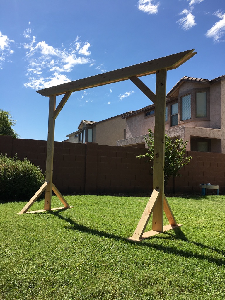 Wedding Arbor | Wedding Arch | Wedding Decor | Rustic Wedding | Wood Arbor | Wedding Ceremony Decor | Learn how to build these beautiful heavy duty arbor for a fraction of the price you would pay to buy one already made! Find the tutorial at SixCleverSisters.com