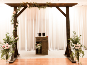 Wedding Arbor | Wedding Arch | Wedding Decor | Rustic Wedding | Wood Arbor | Wedding Ceremony Decor | Learn how to build these beautiful heavy duty arbor for a fraction of the price you would pay to buy one already made! Find the tutorial at SixCleverSisters.com