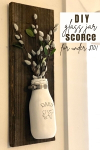 Mason Jar Sconces | DIY Jar Sconce | Mason Jar DIY | Farmhouse Decor | DIY Farmhouse | Learn how to make these beautiful mason jar sconces for your farmhouse at SixCleverSisters.com