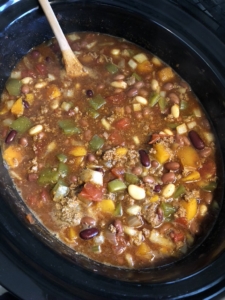 Turkey Chili | Easy Chili Recipe | Crockpot Recipe | Chili Recipe | Easy Chili Recipe | Rainbow Turkey Chili | This yummy and deep-flavored chili is sure to be a hit with anyone (and it has a crazy secret ingredient!) Find the recipe at SixCleverSisters.com