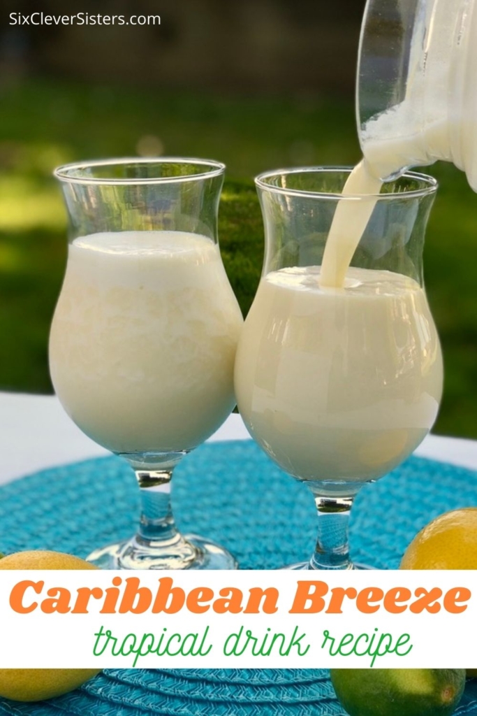 Tropical Drink | Summer Drink Recipe | Coconut Smoothie | Pineapple Drink | Fruity Drink | Drink Recipe | Easy Punch Recipe | Caribbean Breeze Drink | If you love tropical flavors and creamy sweet drinks, this Caribbean Breeze Drink is the recipe for you! Find it at SixCleverSisters.com.