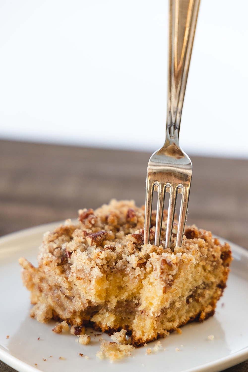 Maple Pecan Coffee Cake | Coffee Cake for a Crowd Brunch | Brunch Coffee Cake | Coffee Cake Recipes | Moist delicious coffee cake layered with lots of maple pecan streusel! Recipe on the Six Clever Sisters blog!