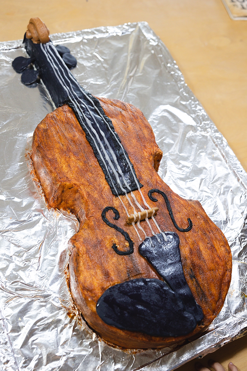 How to Make a Violin Shaped Cake | Violin Cake Ideas Birthday | How to Make a Violin Cake | Violin Birthday Cake | Violin Birthday Ideas | Step-by-step directions + printable template on the Six Clever Sisters blog!