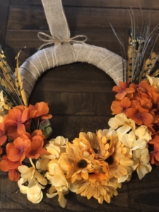 Fall Wreath | Dollar Tree | Autumn Decor | Easy Handmade Wreath | Dollar Tree Decor | Dollar Tree Hack | DIY Fall Wreath | DIY Fall Decor | Cheap Fall Wreath | Dollar Tree has all the florals and supplies you need to make yourself a beautiful fall wreath this year! Find out how I made mine at SixCleverSisters.com