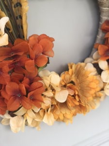 Fall Wreath | Dollar Tree | Autumn Decor | Easy Handmade Wreath | Dollar Tree Decor | Dollar Tree Hack | DIY Fall Wreath | DIY Fall Decor | Cheap Fall Wreath | Dollar Tree has all the florals and supplies you need to make yourself a beautiful fall wreath this year! Find out how I made mine at SixCleverSisters.com