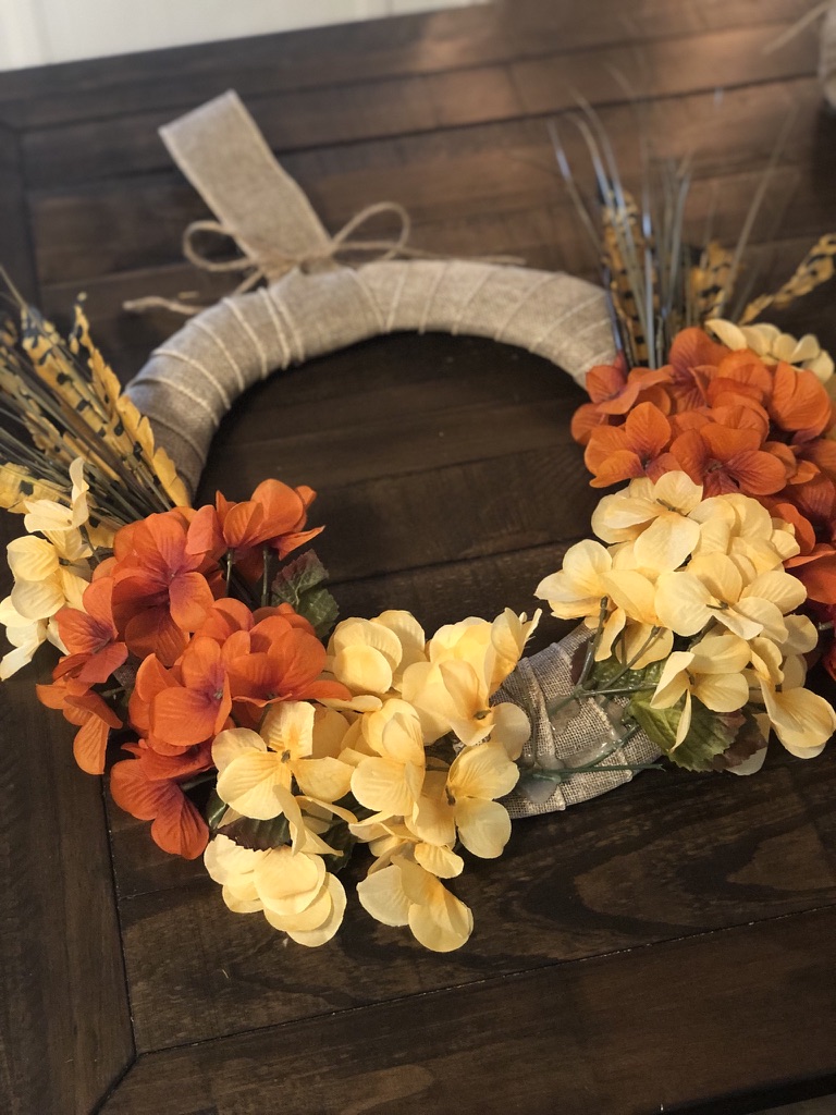 Fall Wreath | Dollar Tree | Autumn Decor | Easy Handmade Wreath | Dollar Tree Decor | Dollar Tree Hack | DIY Fall Wreath | DIY Fall Decor | Cheap Fall Wreath | Dollar Tree has all the florals and supplies you need to make yourself a beautiful fall wreath this year! Find out how I made mine at SixCleverSisters.com