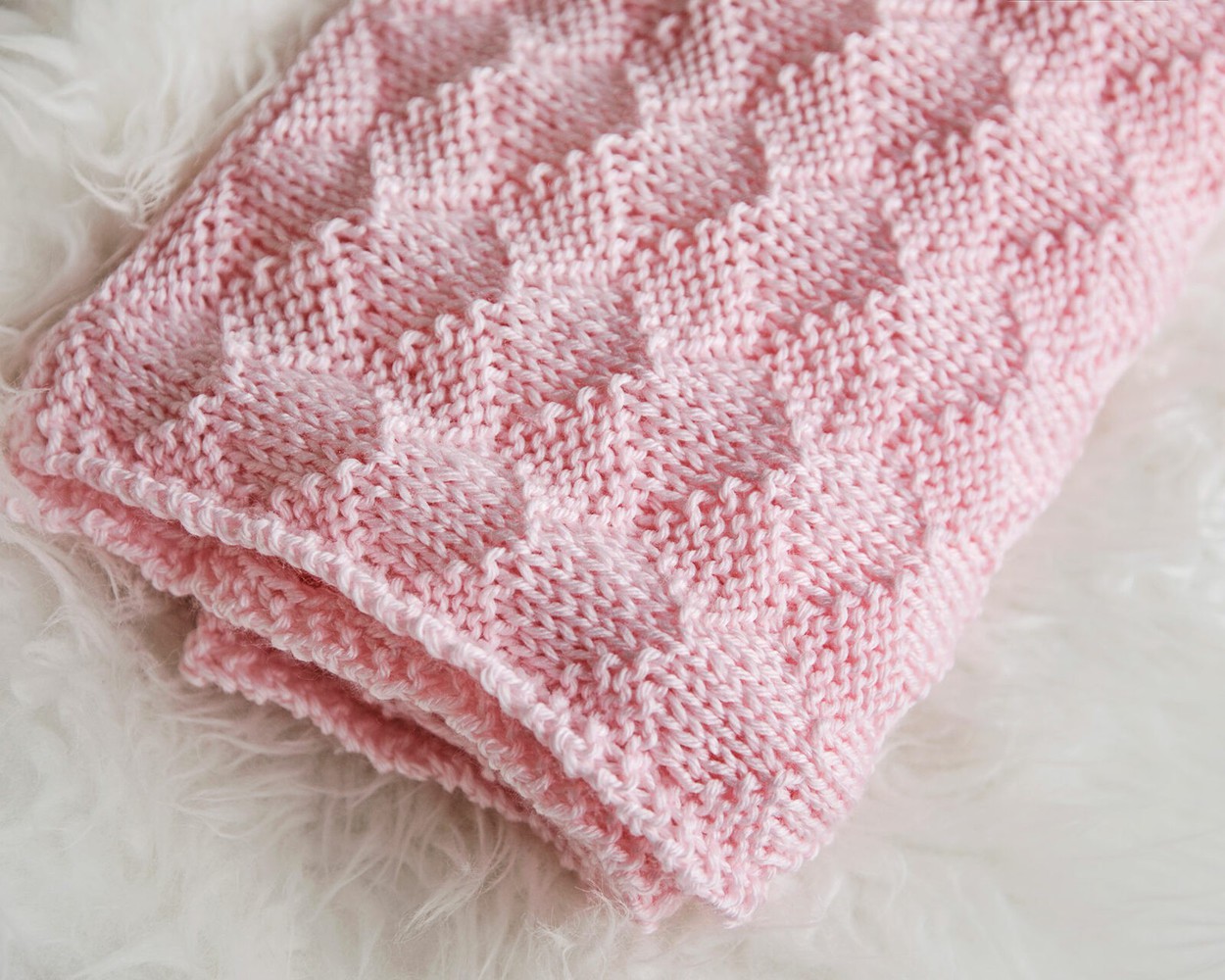 Baby Blanket Knitting Pattern | Free Knitting Patterns for Baby Blankets | Baby Blanket Knitting Pattern Free | Baby Blanket Knitting Patterns for Beginners | Free Knitting Patterns for Baby Blankets | Free Knitting Patterns for Beginners | Baby Blanket Knitting Pattern Free Easy | A knitted baby blanket makes a perfect gift for a new mother! With these free knitting patterns for baby blankets, you are sure to find one your level and one you love! #knit #knitting #pattern #freepattern #baby #craft #blanket