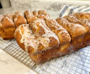 Easy Cinnamon Bread | Dollywood | Dolly Parton | Cinnamon | Frozen bread dough | Pull apart bread | Breakfast | Pastry | Easy Recipe | Easy Breakfast | Easy Dessert | Simple Bread | Dessert | Cinnamon Rolls | Homemade Bread | Homemade cinnamon bread | Six Clever Sisters