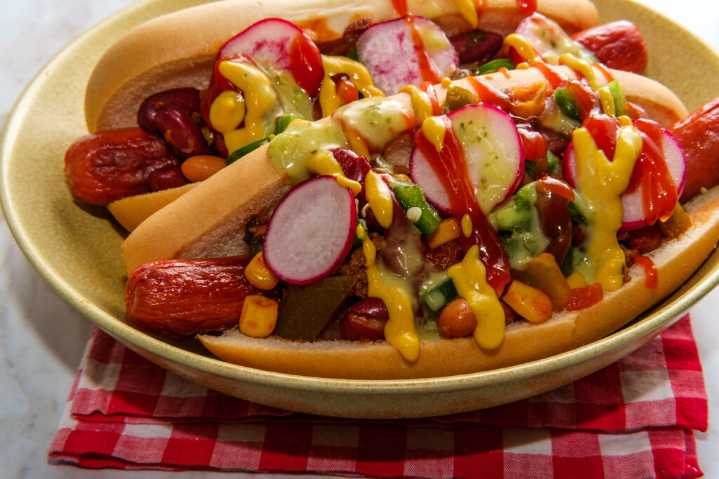 Best Sides for Hot Dogs | What to Serve with Hot Dogs | From Classic to Regional to Unique, these 40+ hot dog sides has what you need! Found at Six Clever Sisters.