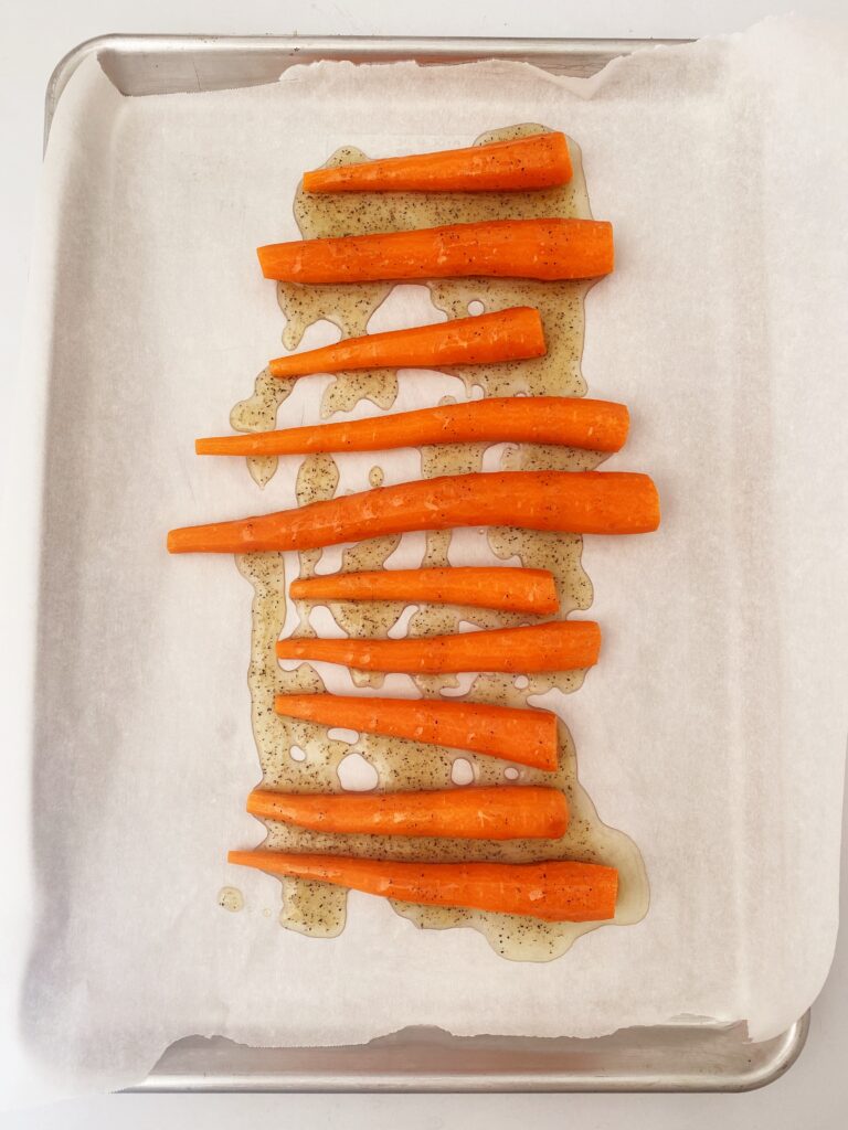 Baked Carrots | Baked Carrots Recipe | Honey Roasted Carrot | Honey Roasted Carrots Recipe | Best Honey Roasted Carrot Recipe | Veggie Side Dishes | Veggie Side Dish Ideas | Looking for a healthy side dish that is simple and easy to make and doesn't require a bunch of ingredients? These carrots are just that! Try these simple baked carrots today! #recipe #recipeoftheday #sidedish #easyrecipe #sides #veggie #vegan