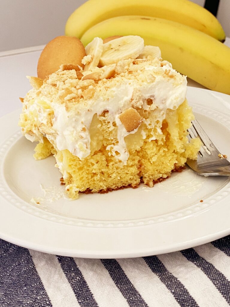 Banana Pudding Poke Cake | Banana Pudding Poke Cake Recipe | Banana Pudding Poke Cake Recipe Easy | Poke Cake Recipes | Poke Cake Recipes Easy | Poke Cake Recipes Pudding | Banana pudding poke cake is a delicious dessert that combines the flavors of banana pudding and cake into one mouth-watering treat. Perfect for a summer treat! #recipe #recipeoftheday #dessert #banana #cake #dessertfoodideas