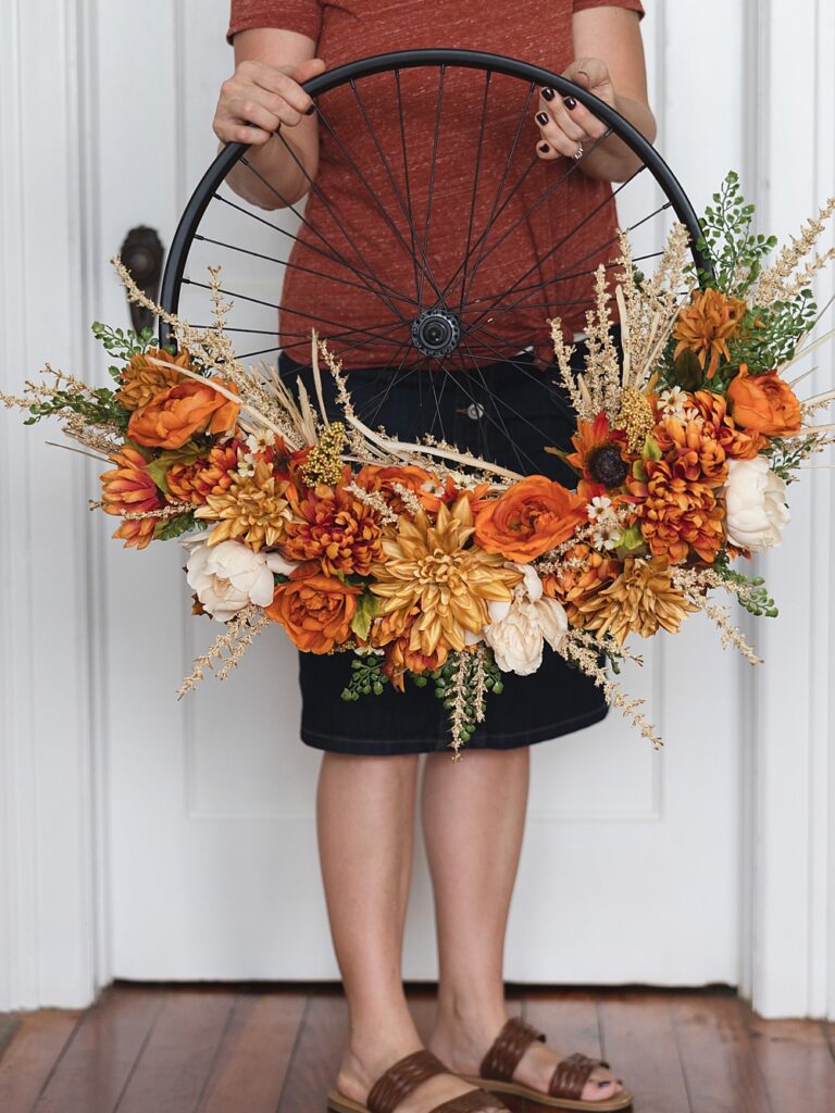 Bicycle Wheel Wreath | Bicycle Wheel Wreath DIY | Bicycle Wheel Wreath Fall | Modern Farmhouse Bicycle Wheel Wreath | Fall wreath in Modern Farmhouse style starts with a bike wheel! Instructions for this fall bike wheel wreath on the Six Clever Sisters blog.