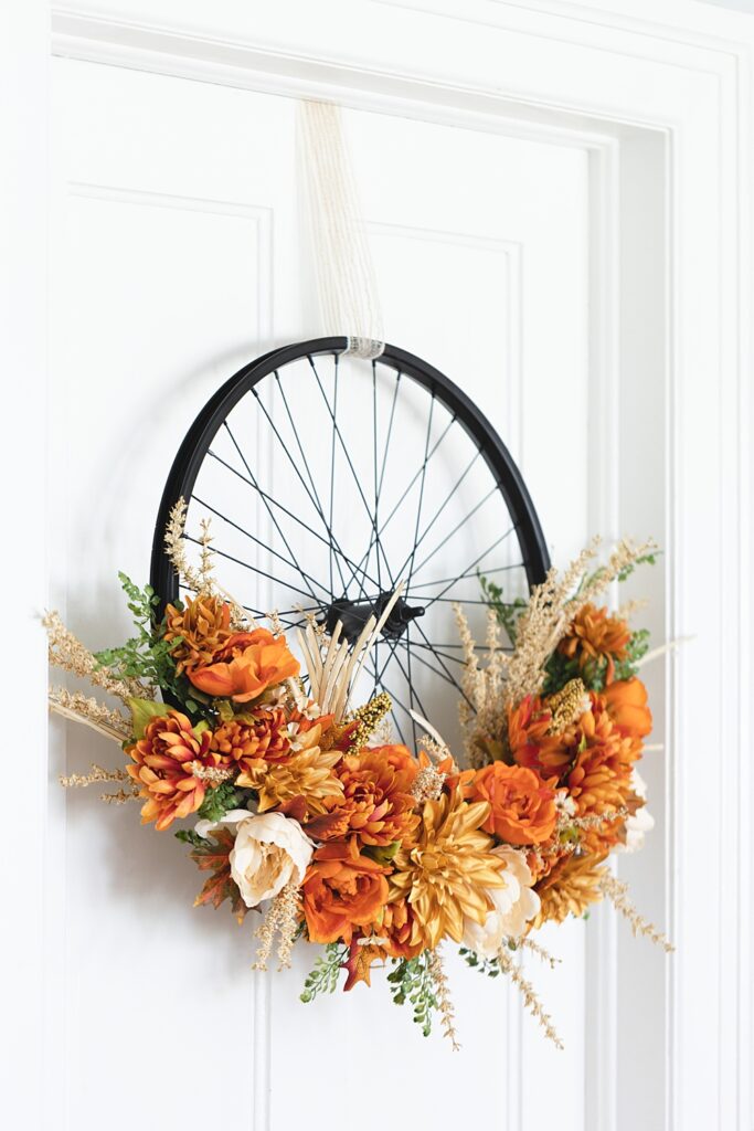 Bicycle Wheel Wreath | Bicycle Wheel Wreath DIY | Bicycle Wheel Wreath Fall | Modern Farmhouse Bicycle Wheel Wreath | Fall wreath in Modern Farmhouse style starts with a bike wheel! Instructions for this fall bike wheel wreath on the Six Clever Sisters blog.