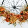 Bicycle Wheel Wreath | Bicycle Wheel Wreath DIY | Bicycle Wheel Wreath Fall | Modern Farmhouse Bicycle Wheel Wreath | Fall wreath in Modern Farmhouse style starts with a bike wheel! Instructions for this fall bike wheel wreath on the Six Clever Sisters blog.